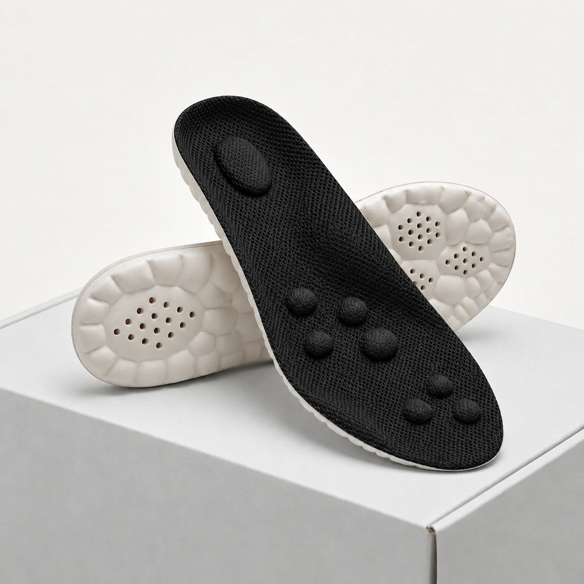 Black shoe insole with cushioned underside